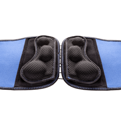 Actimove Sport Back Stabilizer Rigid Panel with Pressure Pads: Detail shot of the removable pressure pads that provide a relieving massage & the rigid back panel for additional strength and stability for the lumbar region. Product appears laid out flat and the camera is at an angle.