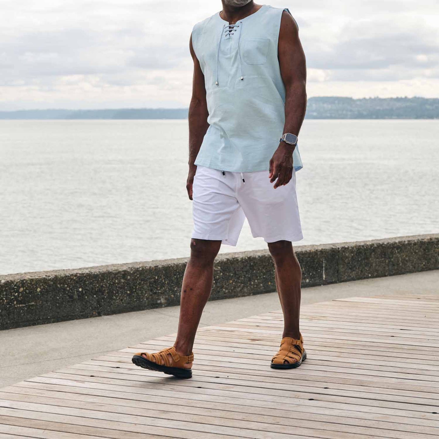 Pete Rodríguez taking a stride on a dock while wearing the Hunter shoes