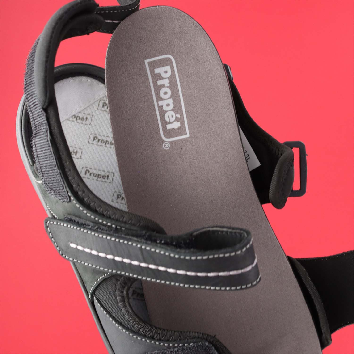 Angled top half view of the orthotic-friendly Hudson sandals showcasing the fully removable footbed for custom or aftermarket orthotics