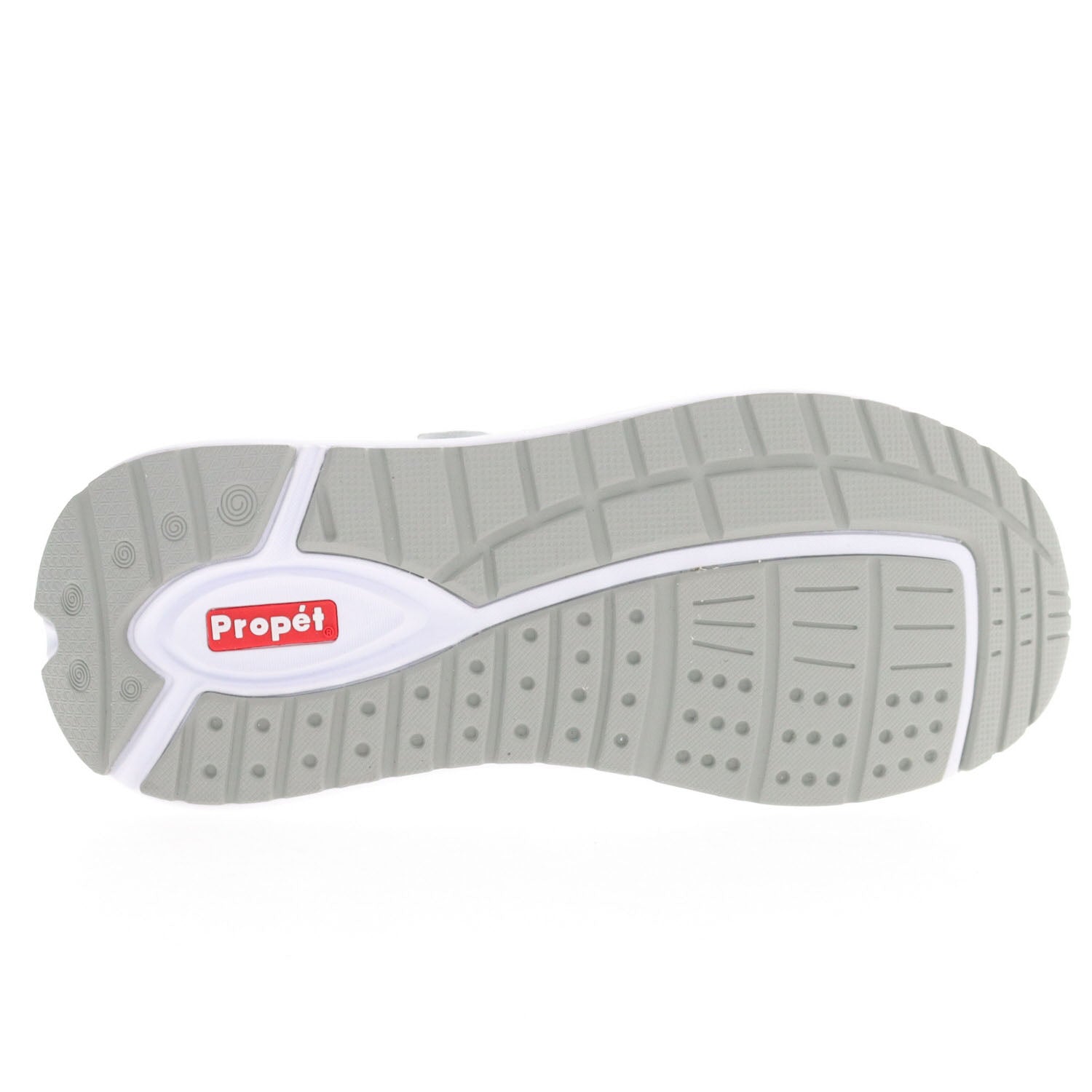 Bottom sole view of the robust rubber tread inserts on the Women's Ultima Strap Athletic shoes that give grip & traction on any terrain